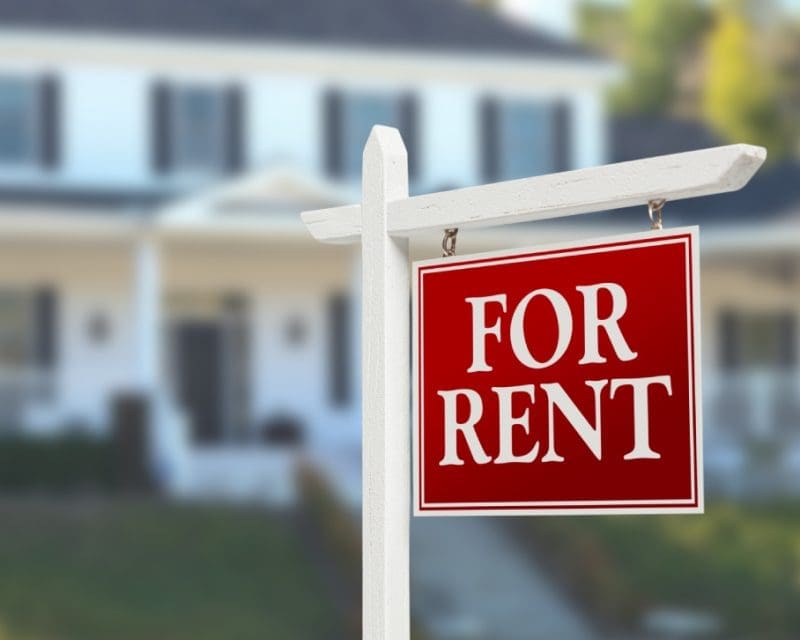 For Rent Sign outside of a home managed by a property manager