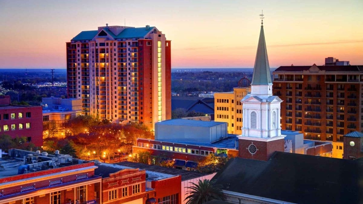 Tallahassee at sunset - including a high rise apartment building and a church downtown